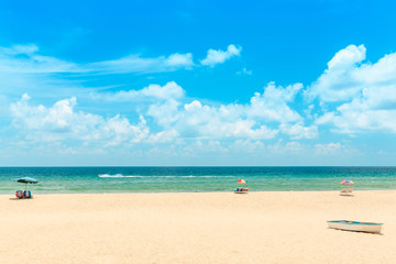 Obraz na płótnie Canvas Ka-ron Beach at Phuket , Thailand. White sand beach with beach umbrella. Summer, Travel, Vacation and Holiday concept.