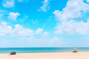 Ka-ron Beach at Phuket , Thailand. White sand beach with beach umbrella. Summer, Travel, Vacation and Holiday concept.