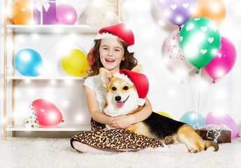 Fototapeta premium child and dog new year and Christmas holidays