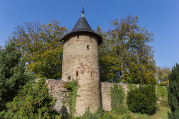 Fototapeta na wymiar Surrounding city wall and defense tower in Wernigerode
