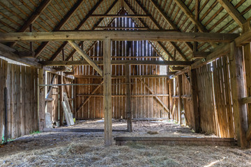 Old desolate barn in Kampinos Forest near Warsaw in Poland - obrazy, fototapety, plakaty