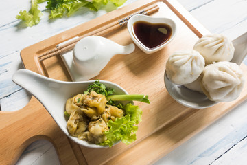 Chinese dim sum Shumai - Steamed  groumet cuisine with the dough gathered at the top.
