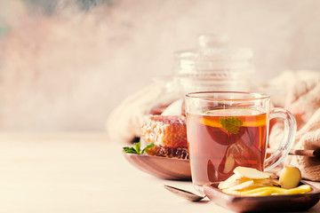 Glass cup of hot tea