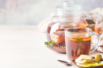 Glass cup of hot tea