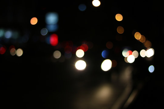 light bokeh on street and abstract background . © khwanchai