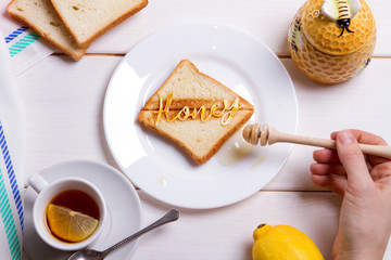 BREAKFAST CONCEPT fried bread toast with honey