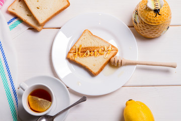 BREAKFAST CONCEPT fried bread toast with honey