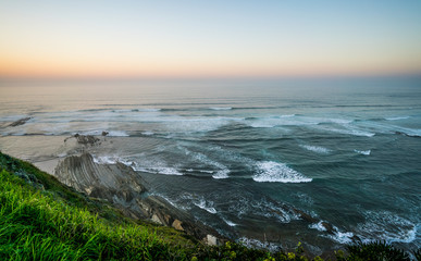 Sea mist over the coast cliffs in Sopelana