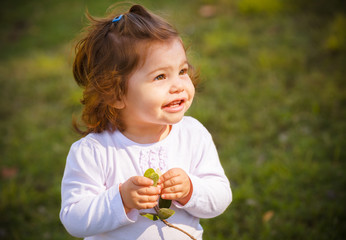 Portrait of baby girl in park