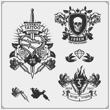 Vector set of tattoo salon labels, badges and design elements. Tattoo studio emblems with professional equipment, sword and skull.
