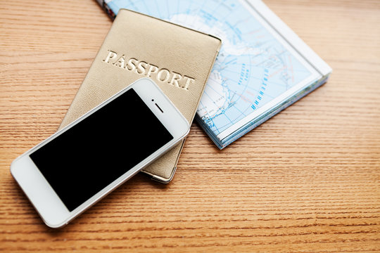 objects for travel isolated on a wooden background