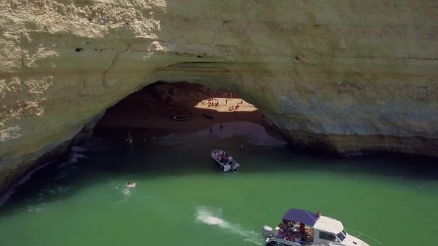 Aerial shot of Praia de Benagil and sea cave, Algarve, Portugal