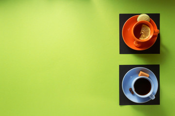 cup of coffee and tea at paper background