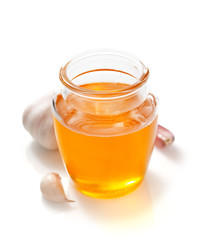 jar of honey on white background