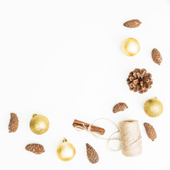 Christmas or New Year concept of Christmas decoration and pine cones on white background. Flat lay, top view