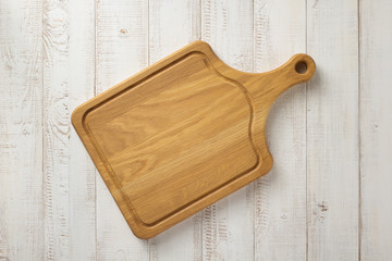 cutting board at wooden background