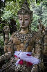 Statue in a forest temple near Chiang Mai Thailand