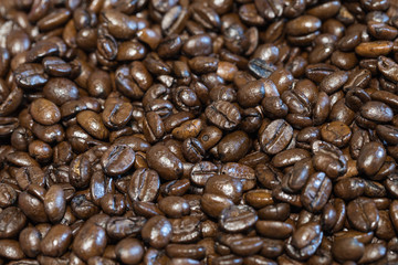 Roasted brown coffee beans, can be used as a background.