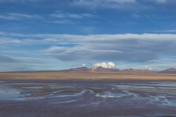 Desert and mountain over blue sky and white clouds on Altiplano,Bolivia