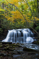 Fototapeta premium Waterfall in Autumn - Upper Falls of Fall Run Creek, Holly River State Park, West Virginia