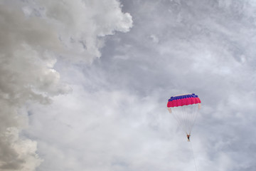 Parasilior in a grey clouds. The active and extreme form of relaxation