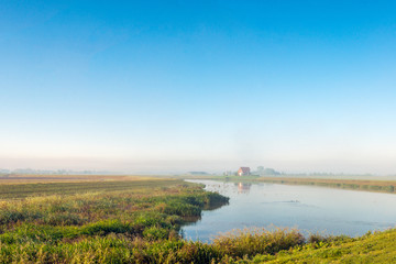 Colorful Dutch polder landscape early in the morning