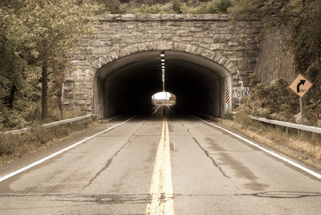 Isolated tunnel in mountain. Vehicle car tunnel in hill. Abstract architectureal detail. Minimal architecture design. Outdoor art.