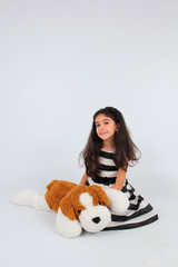 Cute Child Girl with Puppy Toy