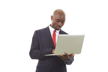 Portrait of African businessman in formal suit posing on white background