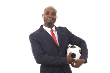 Portrait of African businessman holding soccer ball on white background