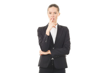 Portrait of young emotional businesswoman in formal suit on white background