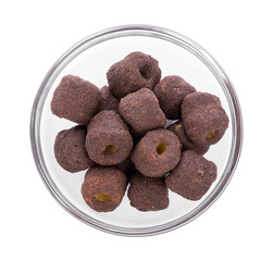 Crunchy corn chocolate snacks on a white background