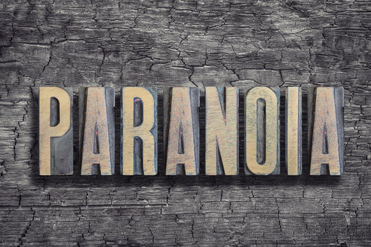 paranoia word burned wood