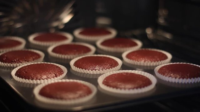 muffins are baked in the oven. close-up. time-lapse