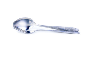 antique fork and spoon on white background
