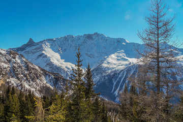Skiing and snowboarding on the mountain of Les arcs, France.
