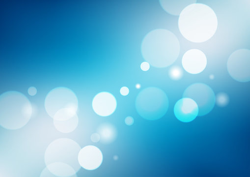 Abstract blue gradient background with a soft white light blur. Vector illustration