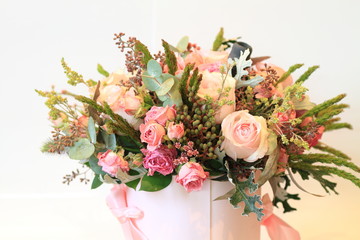 Solemn bouquet of flowers for beautiful ladies, bunch of roses