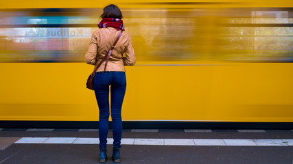 Woman waiting for train. © Red Stroke Photo