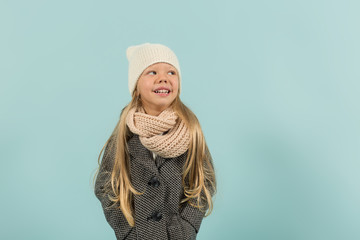 Cute pretty girl in warm clothes