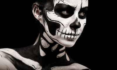 Pretty woman with skeleton tattoo