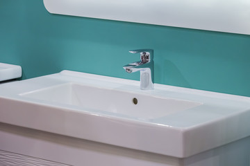 modern faucet in the bathroom, trendy bathtub