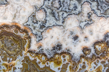 beautiful rich texture of wild marble, brownish white stone fashionable texture covering walls or tables