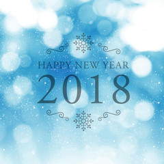 Happy New Year 2018 symbol on blue abstract blur background.