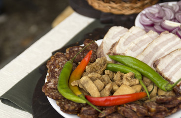 Greaves and meat products with hot peppers