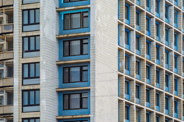 Facade of an old high-rise building. Urbanization concept