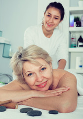 Fototapeta premium Mature woman having massage