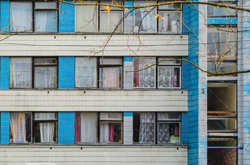 Facade of an old high-rise building. Urbanization concept