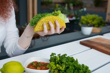 Woman eating mexican food