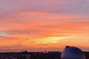 Fototapeta na wymiar Blazing Orange Sunrise Sky Over Miyazaki Science Center